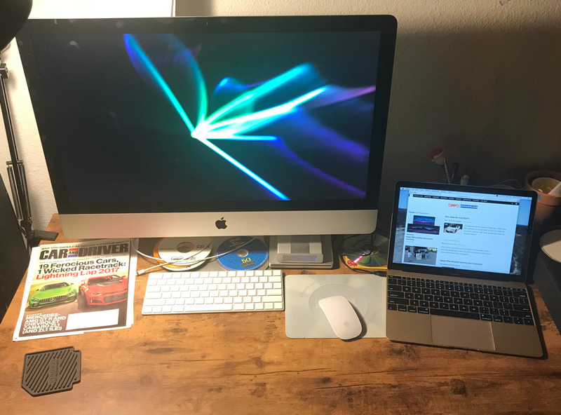 Now kith! Yes, the MacBook is connected to the iMac with a USB-C to USB-C cable. The iMac does charge the MacBook, but it’s maximum power output it much lower than the MacBook AC adapter, so it happens slowly.